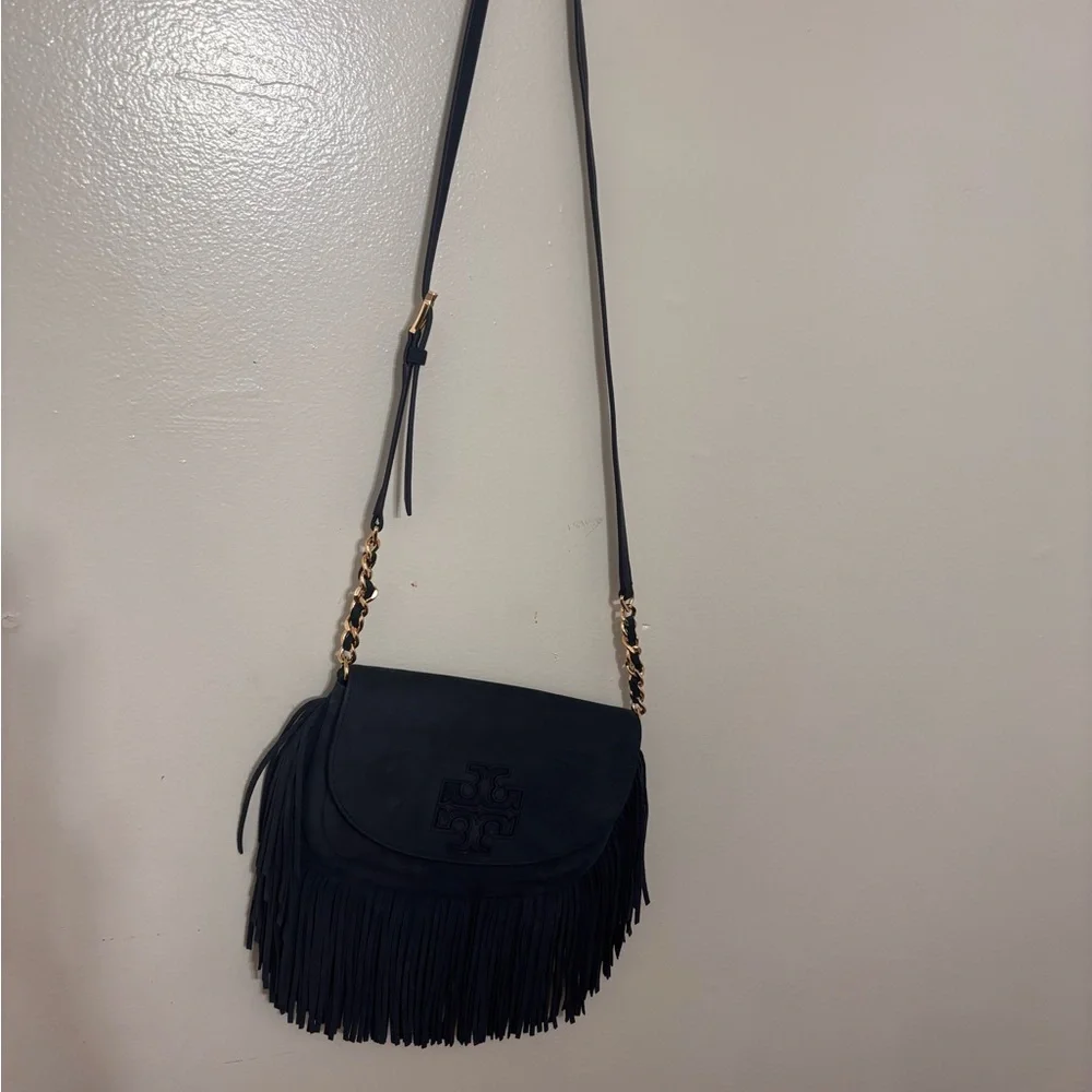 “Tory Burch Fleming Suede Fringe Crossbody Bag – Navy Blue”

• - Picture 6 of 10